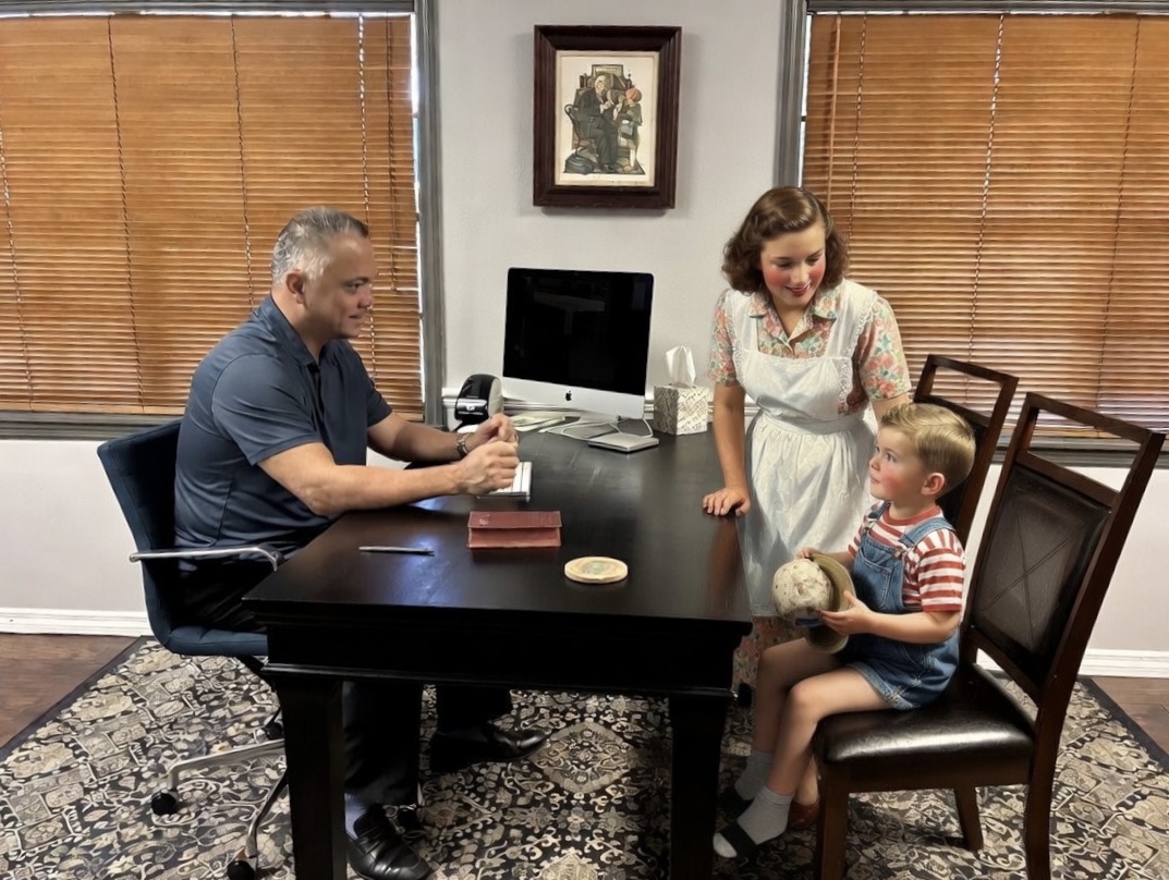 Concierge physician providing family-centered care in a warm, traditional setting